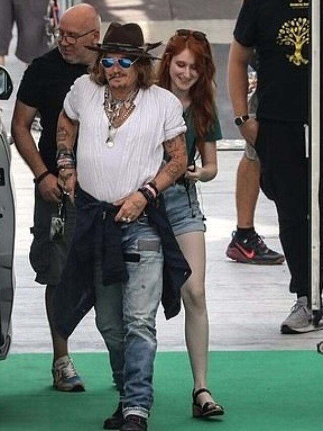 Johnny Depp with a red-haired mystery woman